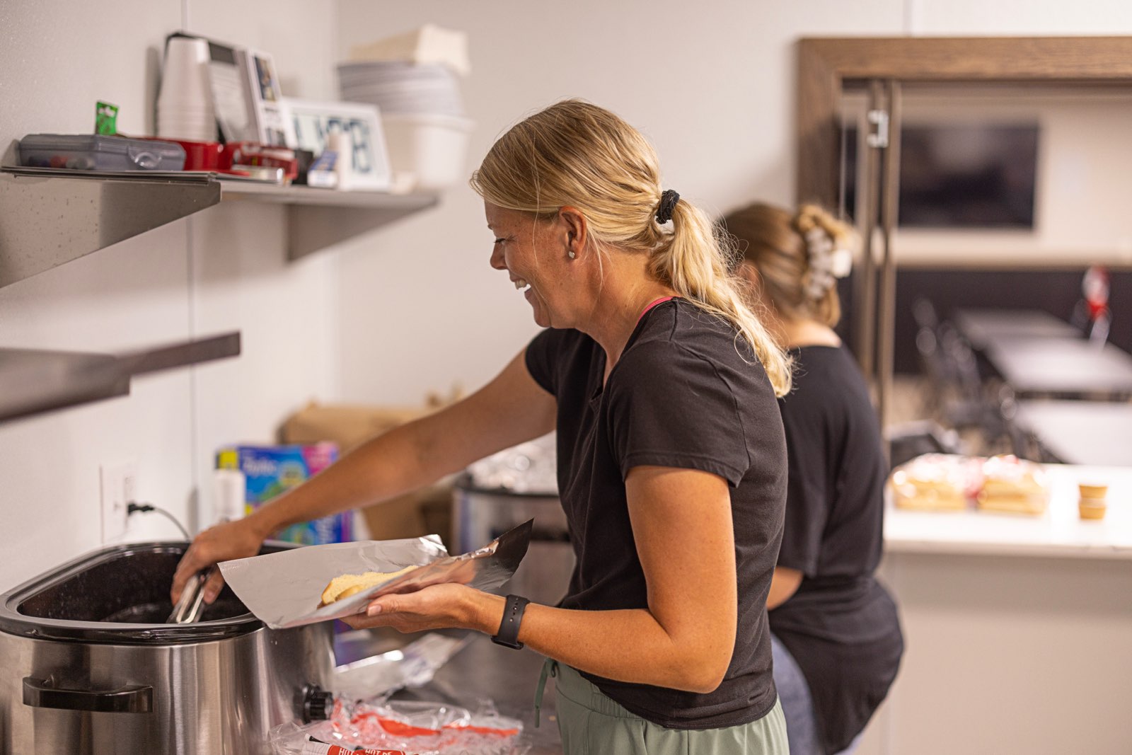 volunteers in the food pantry summer lunch building