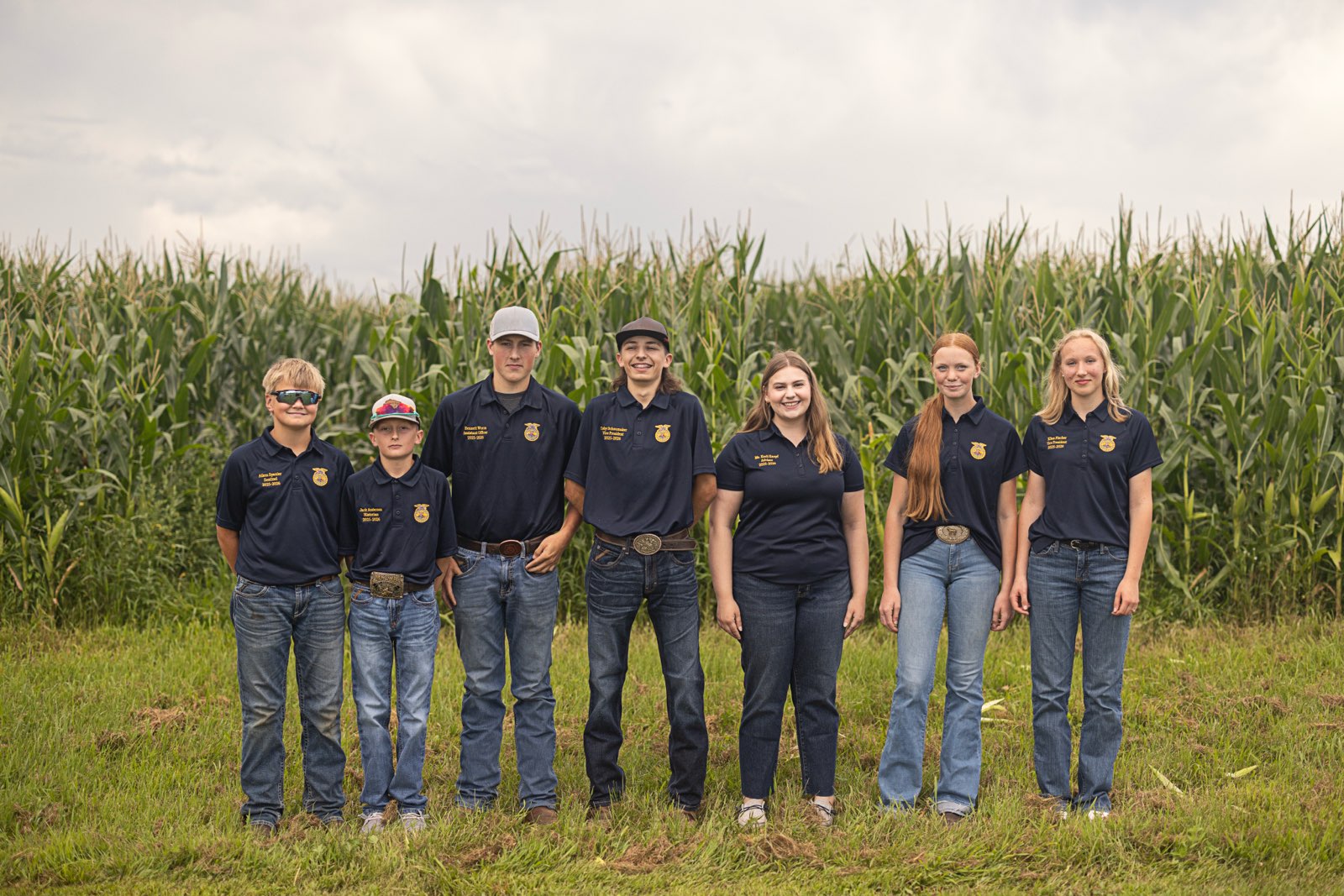 bbe ffa students standing by a corn field