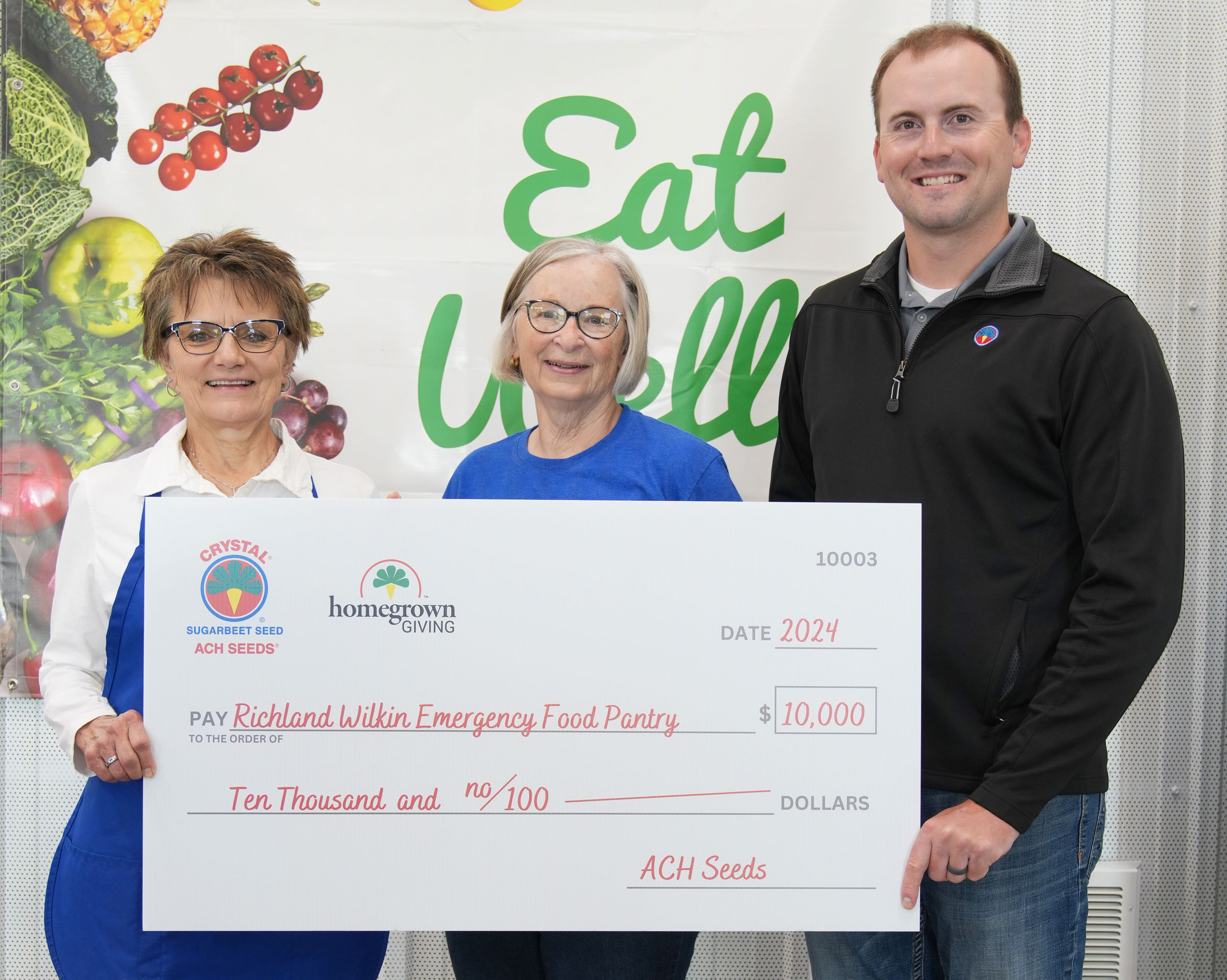 Richland Wilkin Emergency Food Pantry with their $10,000 check